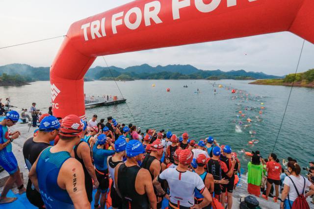 Athletes brave heat in annual triathlon