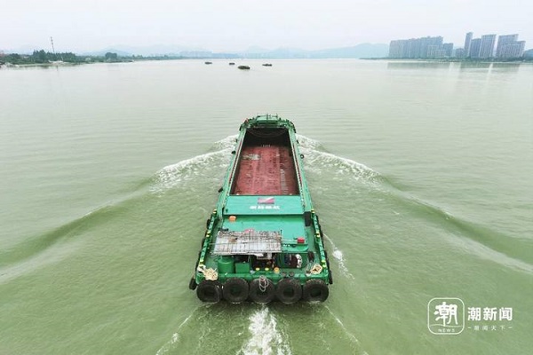 First electric cargo ship sets sail on Hangzhou's Grand Canal