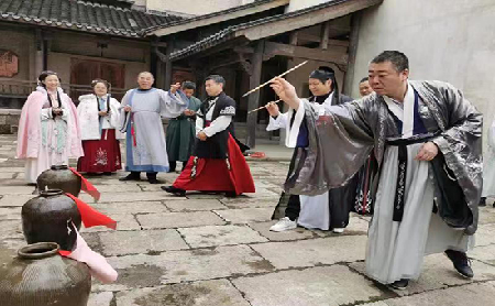 People play ancient sports to welcome Asian Games